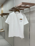 Off-white crew-neck T-shirt with chest pocket and small logo patch