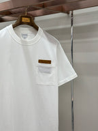 Off-white crew-neck T-shirt with chest pocket and logo patch