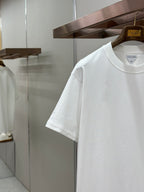 Off-white T-shirt sleeve and chest pocket detail