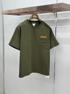 Olive green crew-neck T-shirt with chest pocket and logo patch