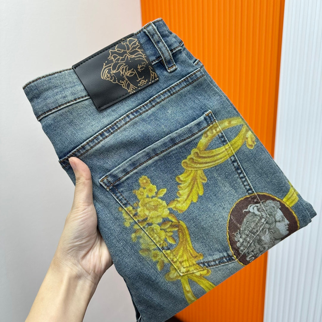 Light blue Versace jeans with gold baroque medallion face print, front pocket close-up