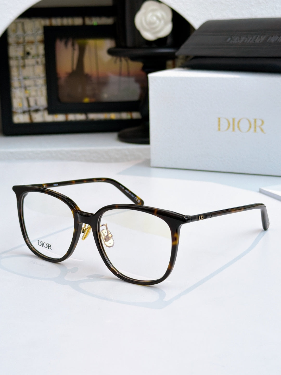 Tortoiseshell full-rim eyeglasses with Dior logo, gold-toned bridge detail