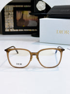 Brown-gold full-rim eyeglasses with Dior logo on lenses and curved temples