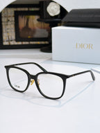 Black full-rim eyeglasses with clear lenses, front angled view, Dior logo