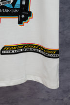 White Louis Vuitton T-shirt hem with black “From the House of Louis” graphic