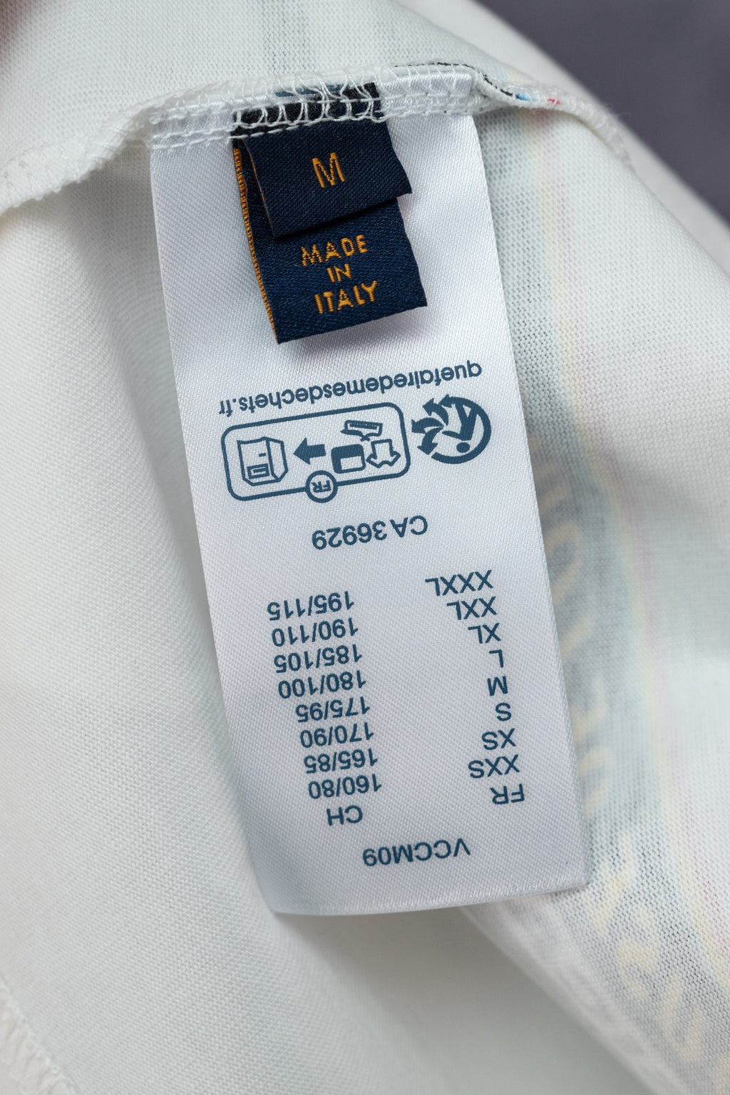 White Louis Vuitton T-shirt with Made in Italy size label and care symbols