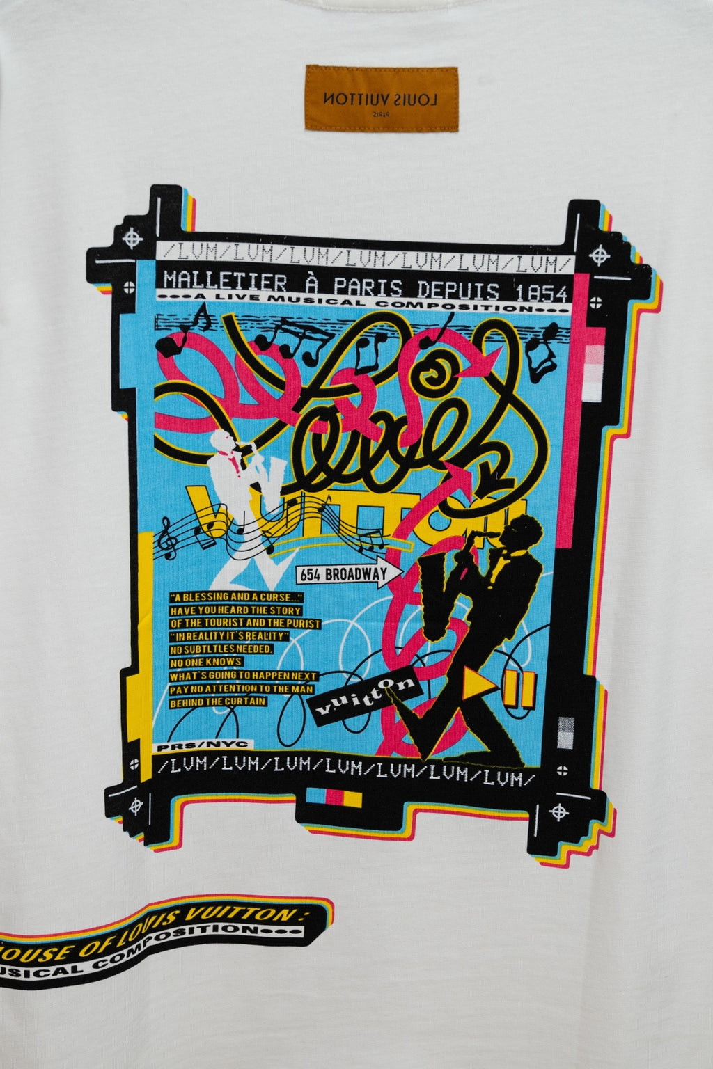White Louis Vuitton T-shirt with colorful “Malletier a Paris” graphic print