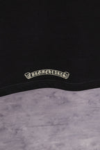 Black T-shirt with small embroidered logo at inner hem