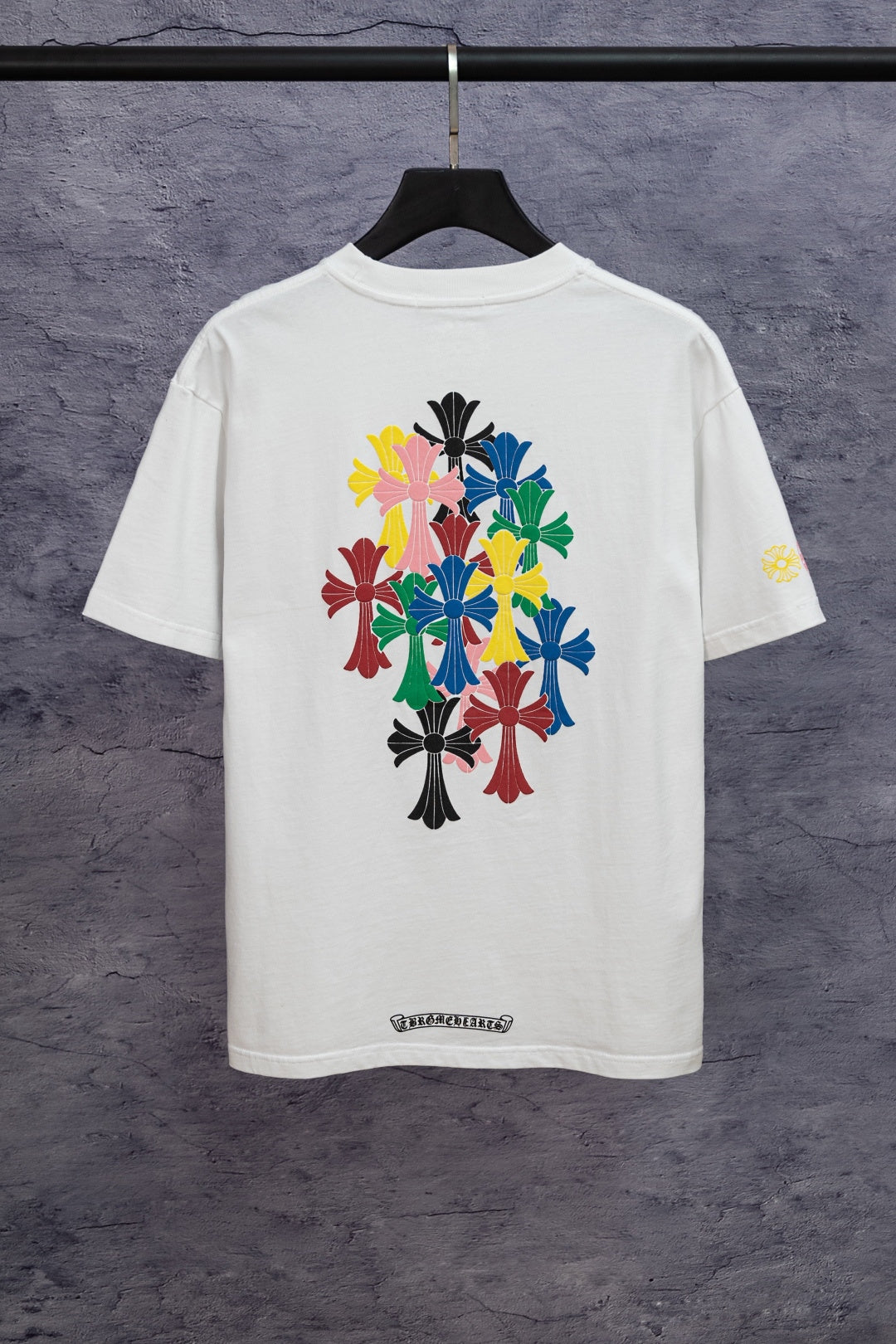 White short-sleeve T-shirt with large colorful back floral emblem