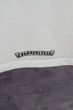White T-shirt with small black logo text near the hem