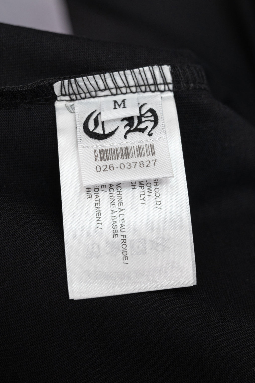 Black T-shirt size label tag marked M