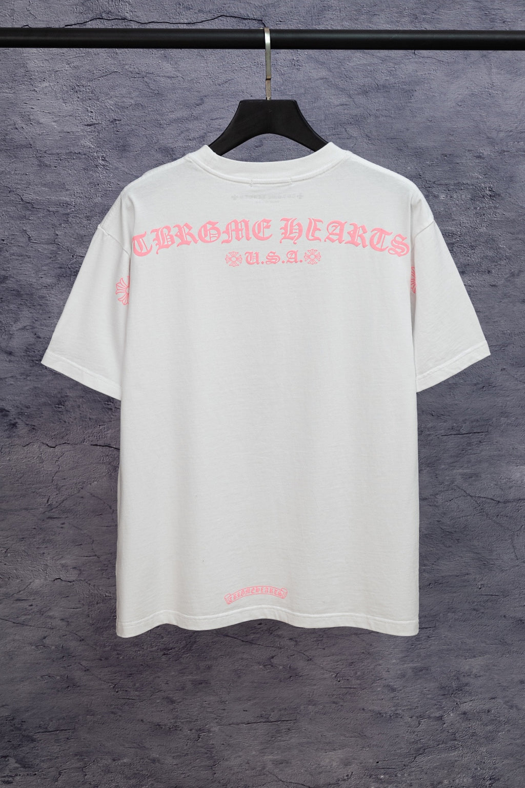 White short-sleeve T-shirt with large back graphic text