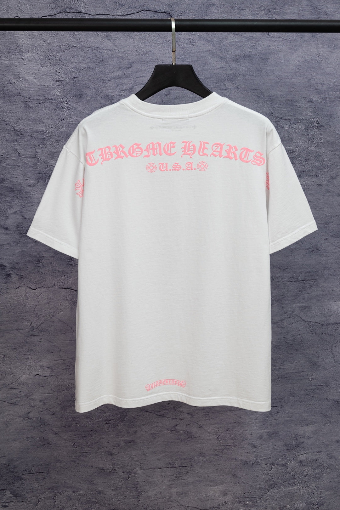 White short-sleeve T-shirt with large back graphic text