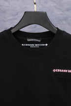 Black short-sleeve T-shirt neckline with small Chrome Hearts logo and Made in U.S.A.