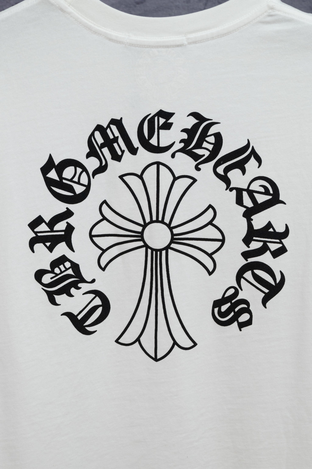 White T-shirt with large black floral cross front graphic