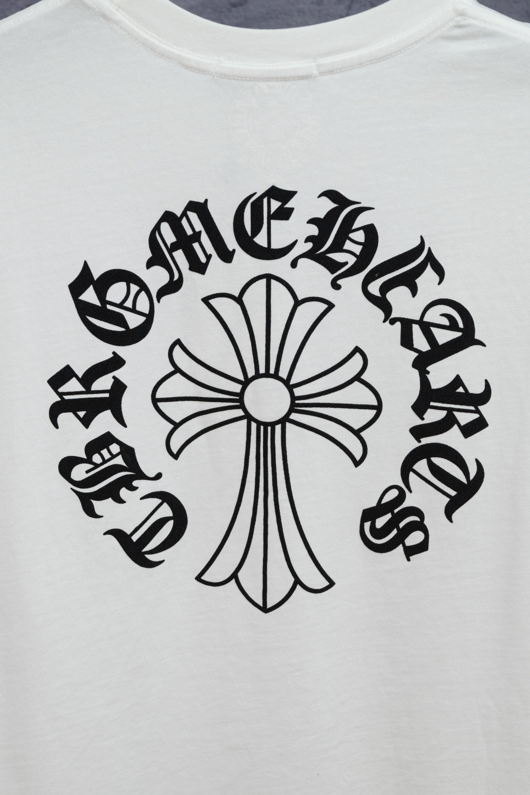 White T-shirt with large black floral cross front graphic
