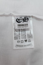 White short-sleeve T-shirt interior neck label with size and care info