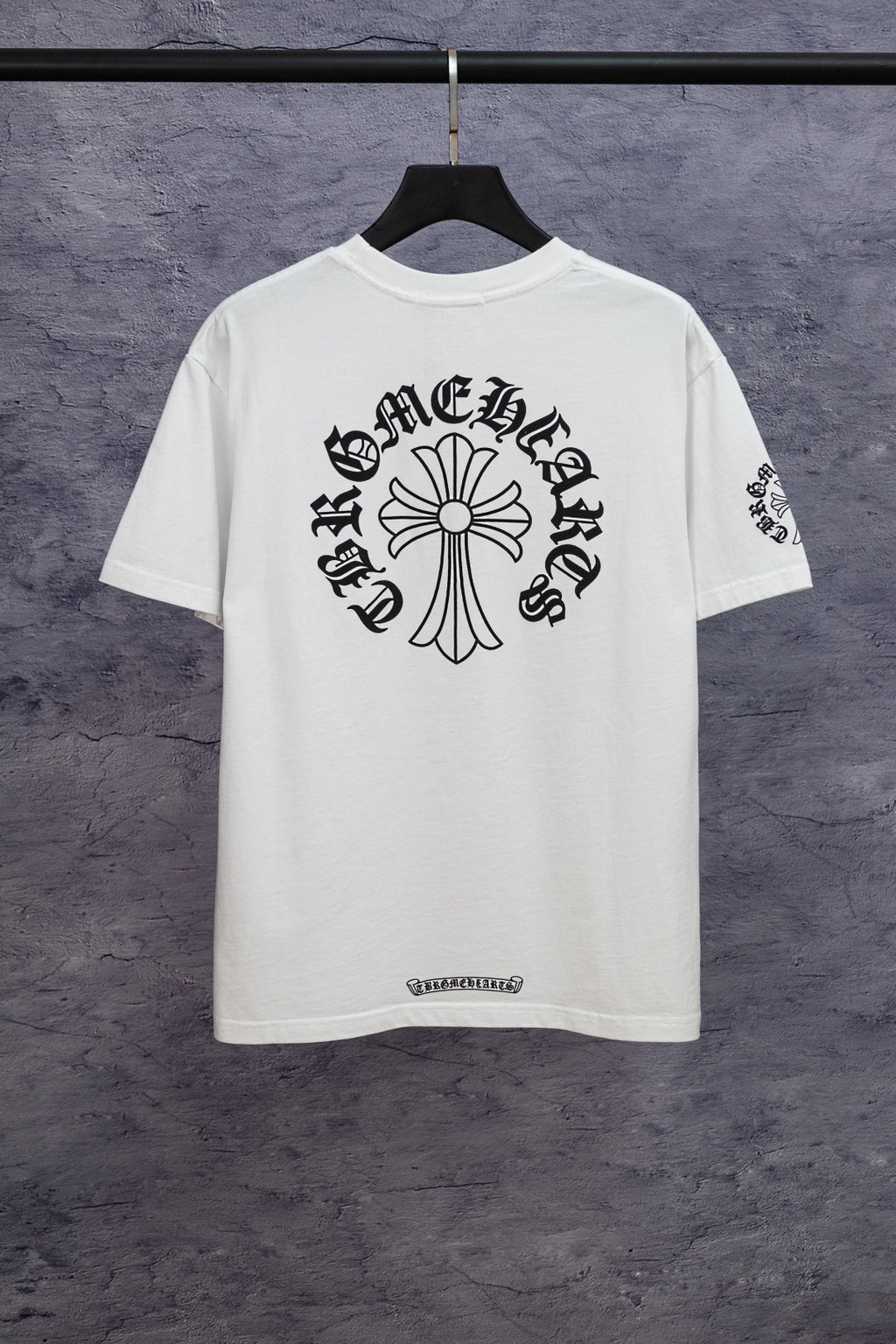 White short-sleeve T-shirt with large center floral cross graphic on back