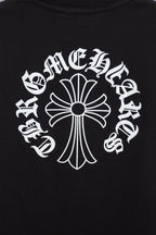 Black T-shirt front with large white cross-like emblem graphic