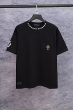 Black short-sleeve T-shirt with small chest graphic and crew neckline