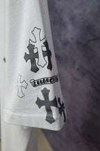 White short-sleeve T-shirt sleeve with dark cross icons and blue print