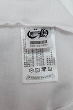 White T-shirt inner neck label with size and care information