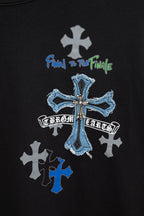 Black T-shirt chest graphic with blue cross and white cross symbols