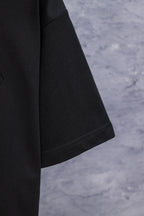 Black T-shirt sleeve and side hem stitching