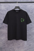Black short-sleeve T-shirt with small neon-green emblem on chest