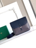 Navy monogram flap shoulder bag with blue crossbody strap and top zipper