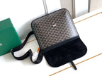 Goyard shoulder bag with gray patterned front and black bottom, with fabric strap