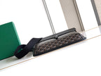Goyard long crossbody bag lying down, black top and gray patterned front panel