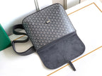 Goyard bag with gray patterned front, dark suede-style bottom, and strap