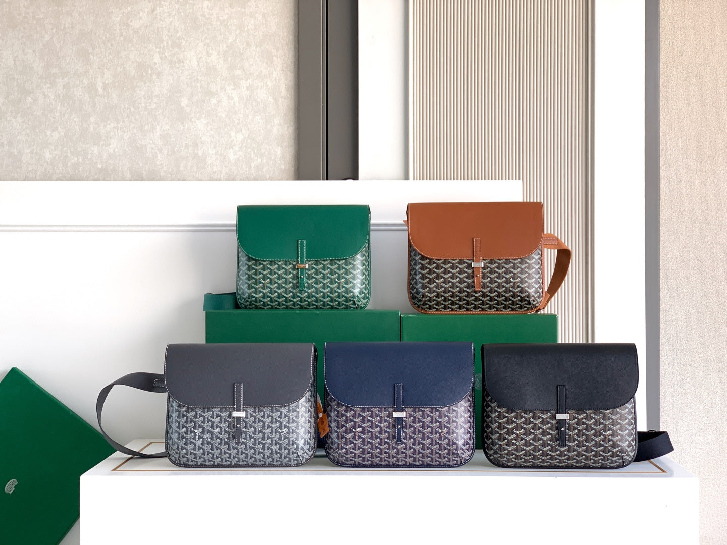 Goyard crossbody bags set with geometric pattern, flap closures, multiple colors.
