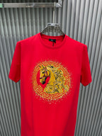 Versace red T-shirt with large gold lion medallion print, round crew neck, short sleeves