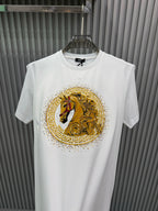 White crew-neck short-sleeve T-shirt with large gold lion medallion graphic