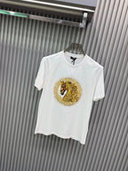 White crew-neck T-shirt with gold lion medallion print and short sleeves