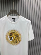 White crew-neck T-shirt featuring gold lion medallion graphic at center front