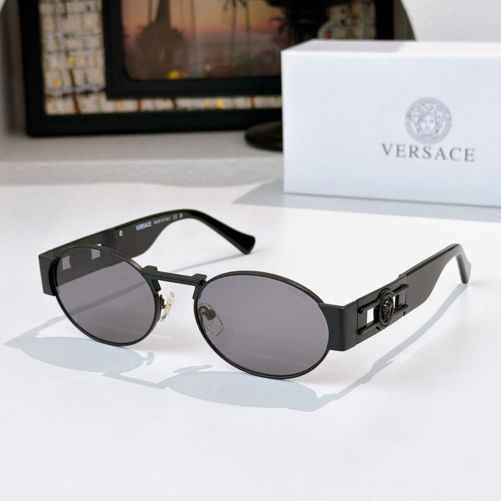 Versace sunglasses, dark frames, dark lenses, metal logo detail on temples