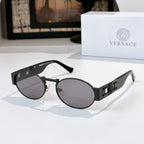 Versace sunglasses, dark frames, dark lenses, metal logo detail on temples