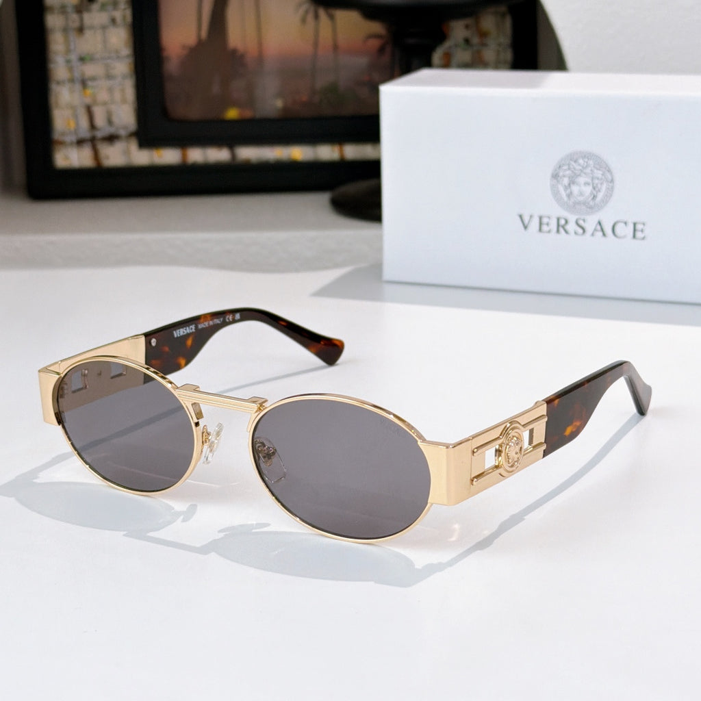 Versace sunglasses, gold-tone round frames, brown lenses, tortoiseshell temple tips