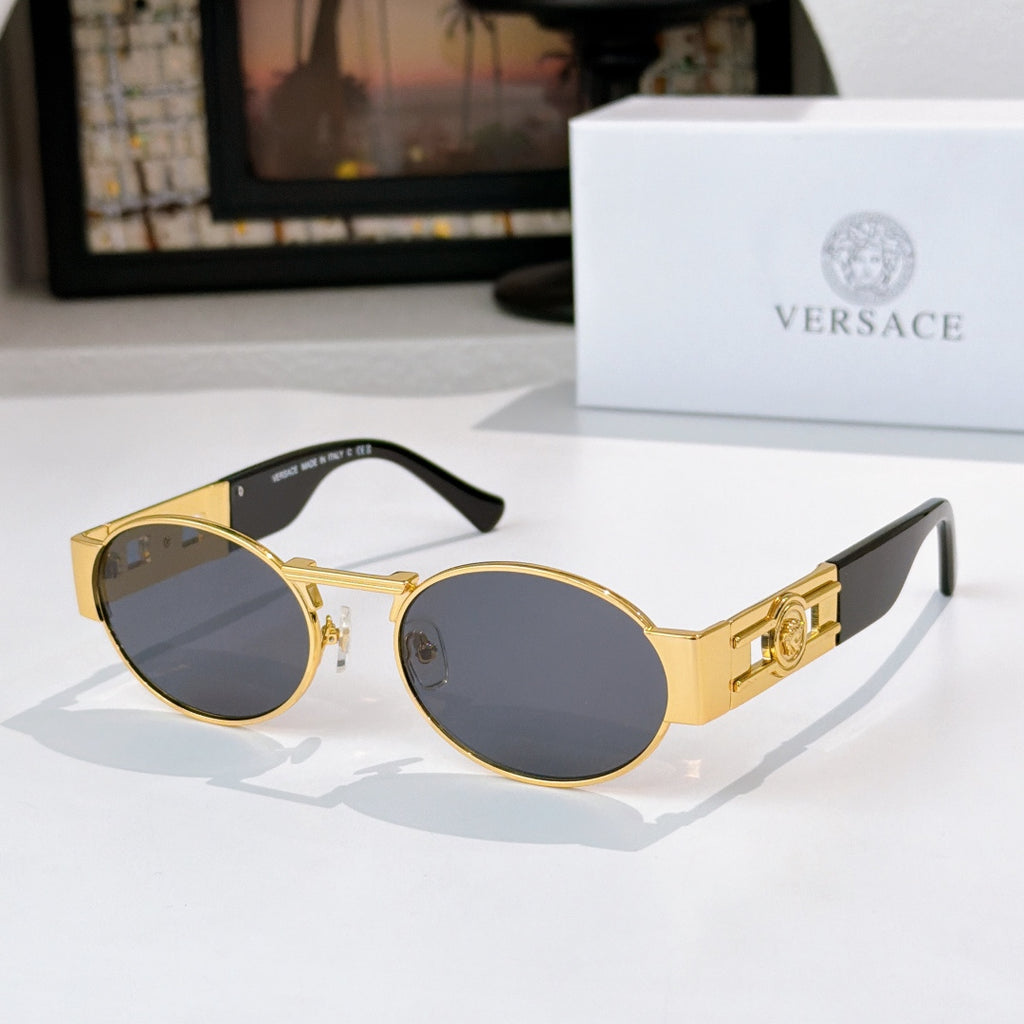 Versace sunglasses, gold-tone round frames, dark lenses, black temple tips