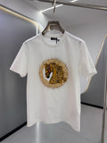 White crew-neck T-shirt with gold and black horse emblem print at the chest