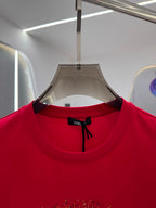 Versace red T-shirt neckline with black bow logo tag