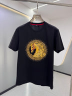 Versace T-shirt in dark navy with gold and red circular horse graphic on front