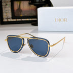 Dior sunglasses with gold frame and blue tinted lenses, cat-eye silhouette