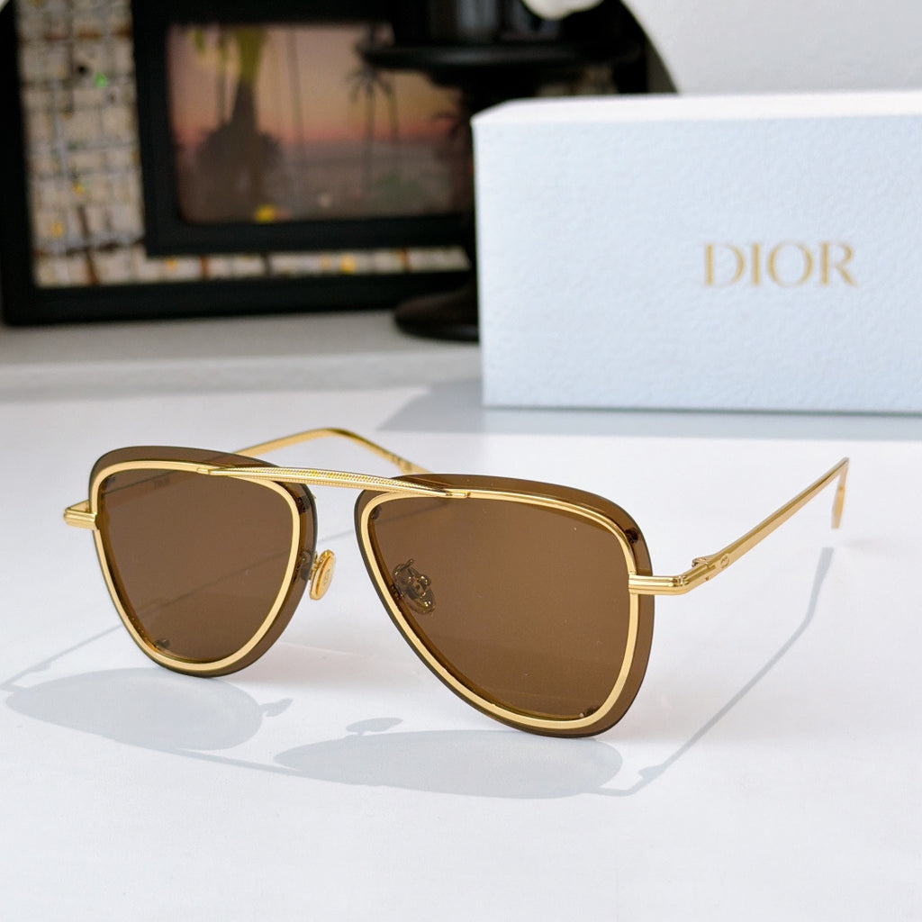 Dior sunglasses with gold frame and brown tinted lenses, angled view