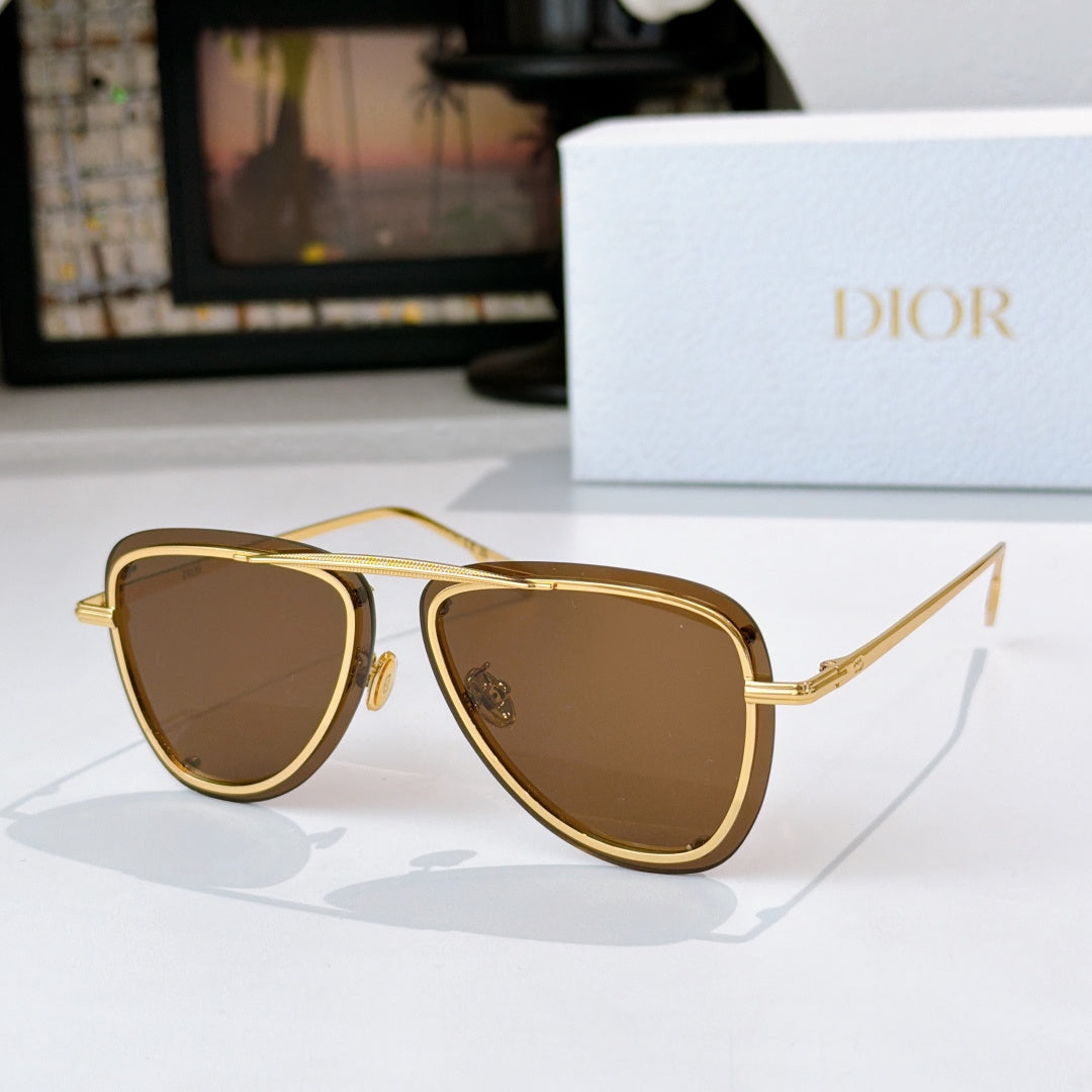 Dior sunglasses with gold frame and brown tinted lenses, angled view