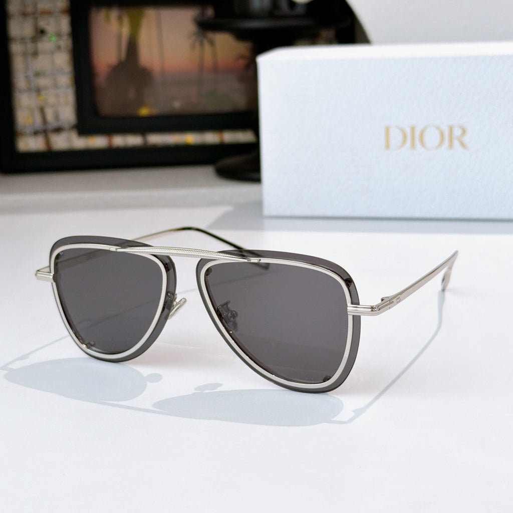 Dior sunglasses with silver frame and dark tinted lenses, cat-eye style