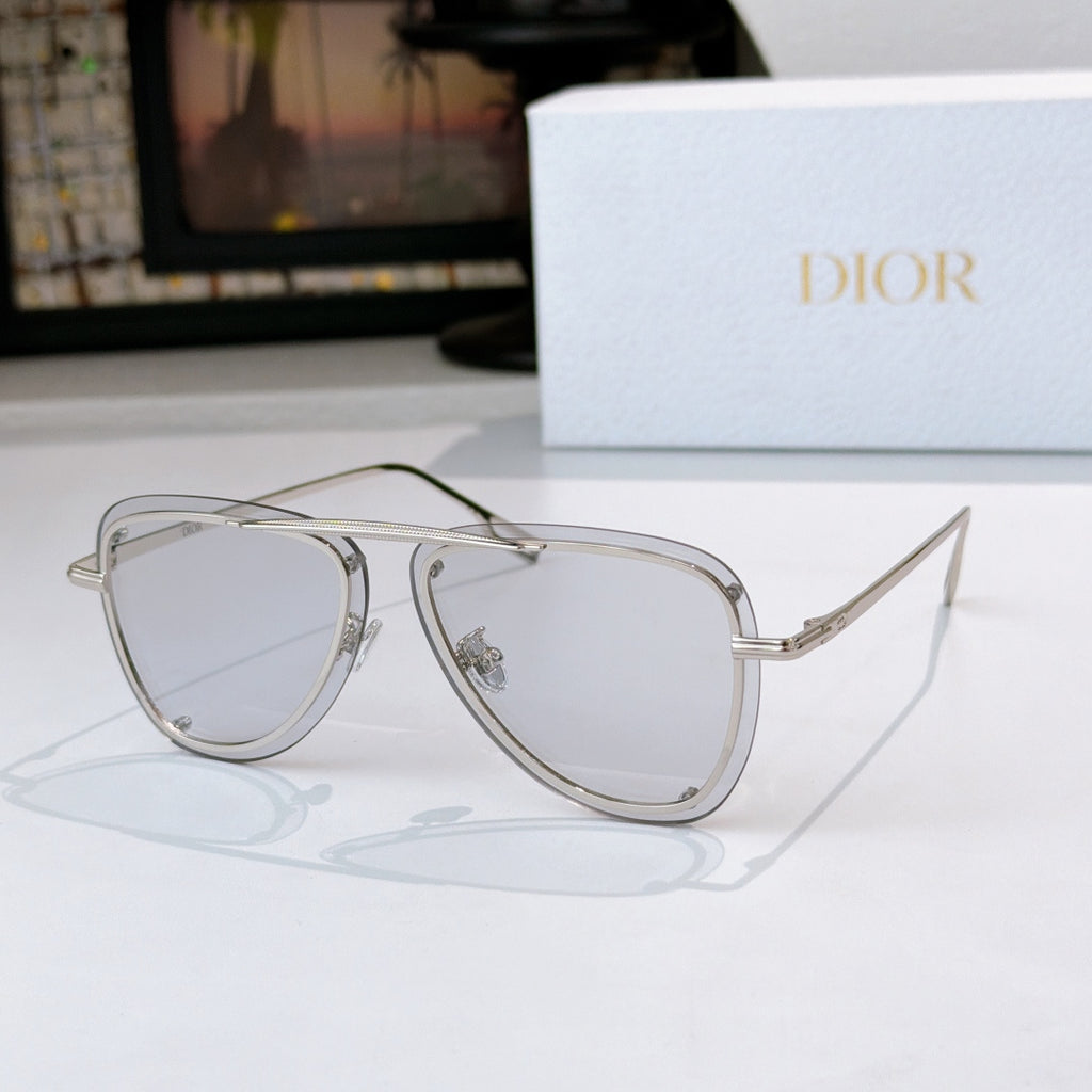 Dior sunglasses with clear frame and light tinted lenses, metal aviator shape